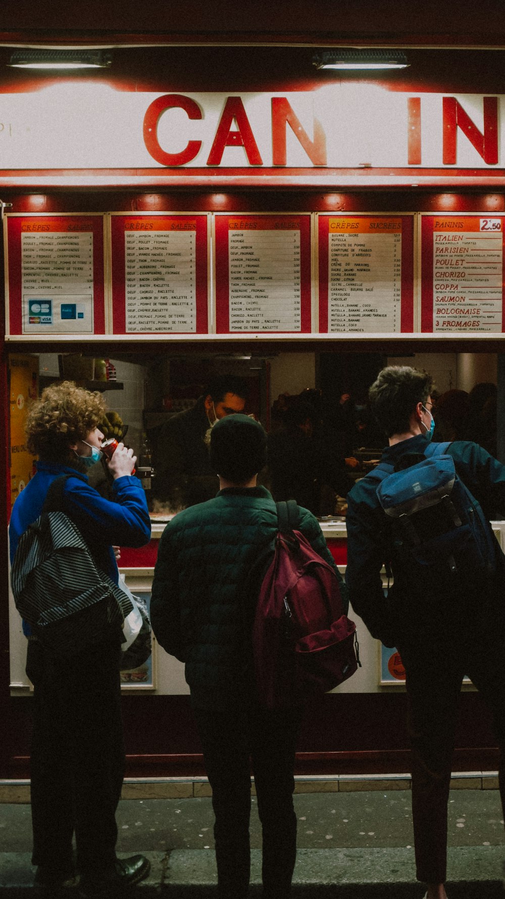 people sitting on chair in front of table