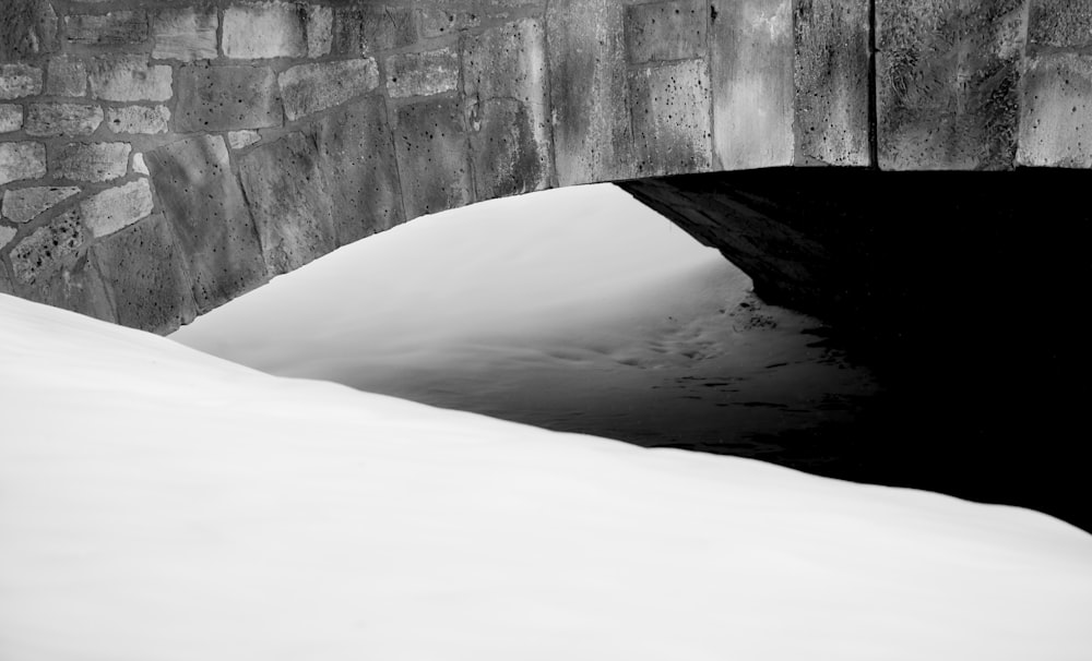 grayscale photo of concrete wall