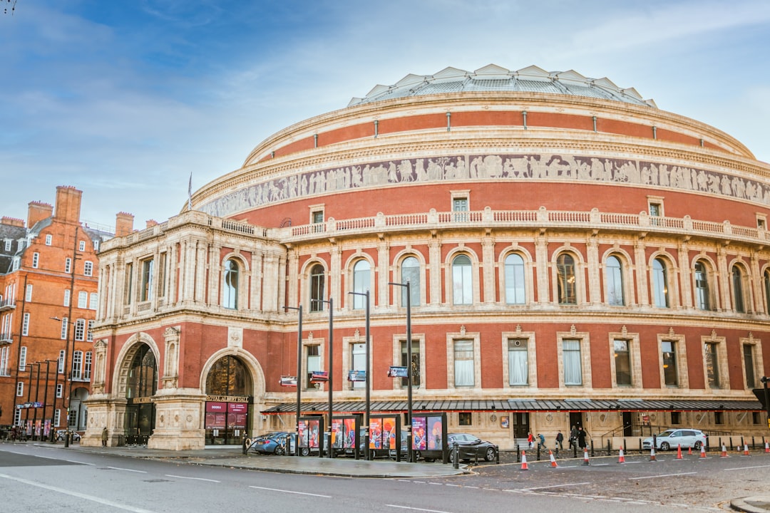 brown concrete building under blue sky during daytime, Royal Albert Hall,London, SW7 2AP, United Kingdom,Kensington Gore, South Kensington, 