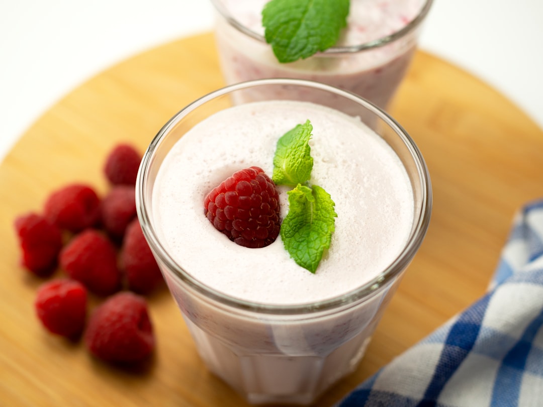 strawberry ice cream in clear glass cup