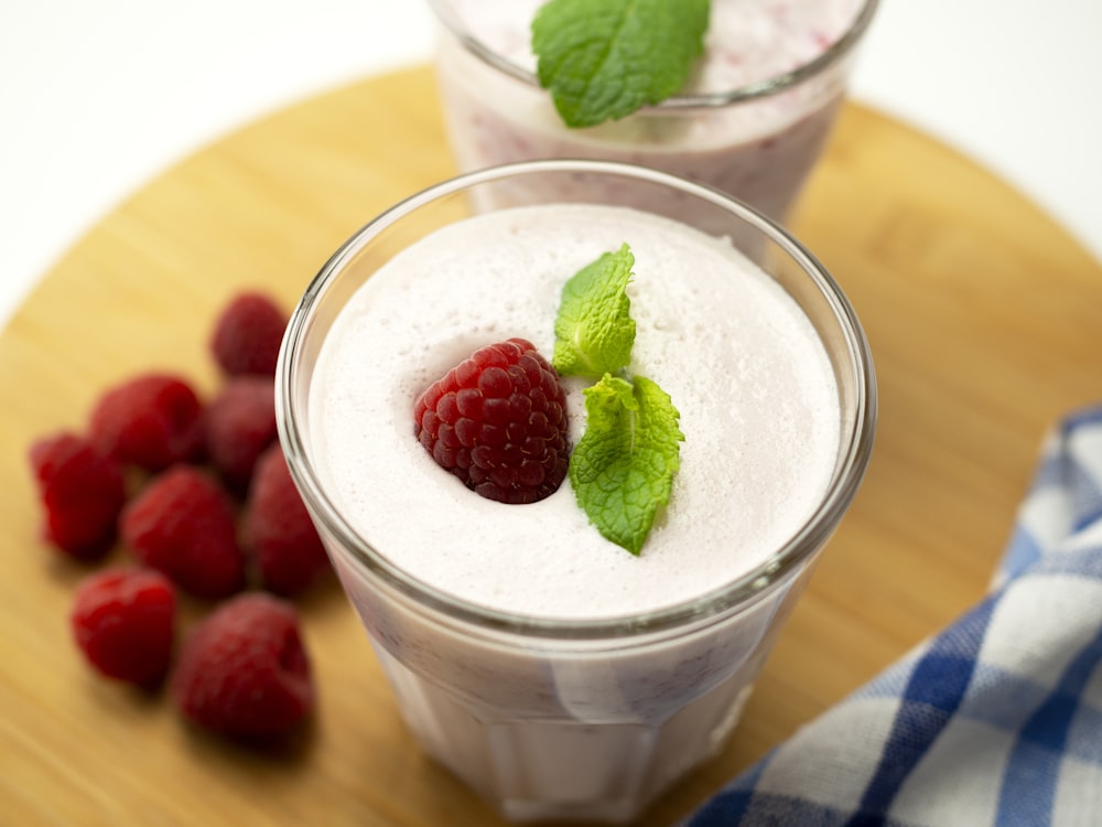 strawberry ice cream in clear glass cup