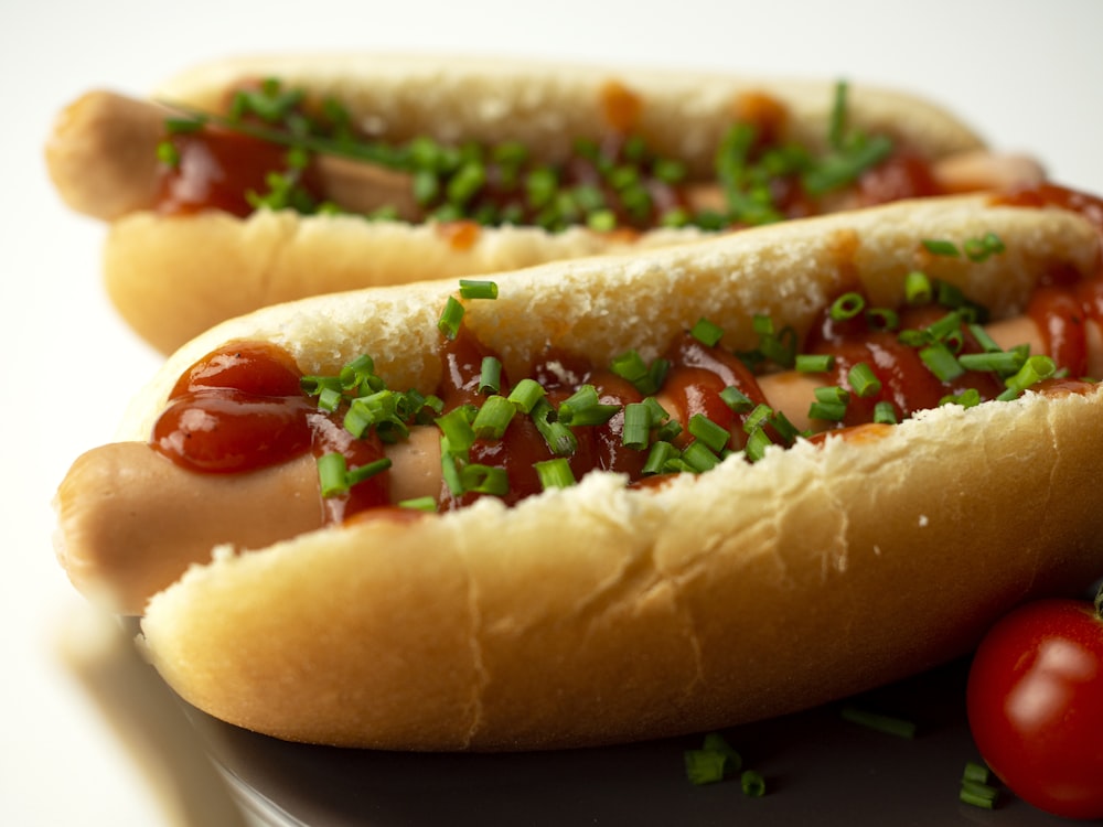 hotdog sandwich on white ceramic plate