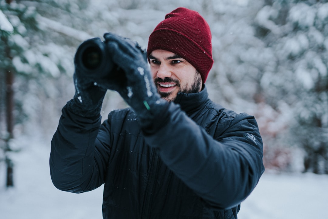 Malte Helmhold is a german blogger and influencer. Just use this image for your blog or social media projects if you want to display a influencer taking images in the snow. 