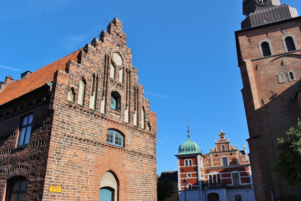 brown concrete building under blue sky during daytime