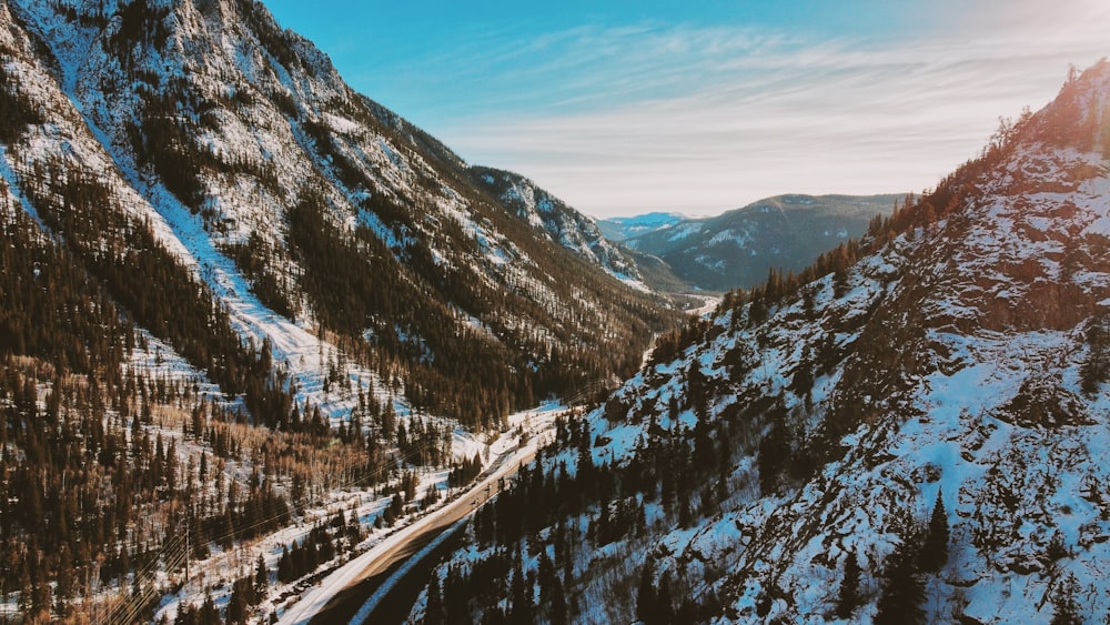 snow covered mountain during daytime