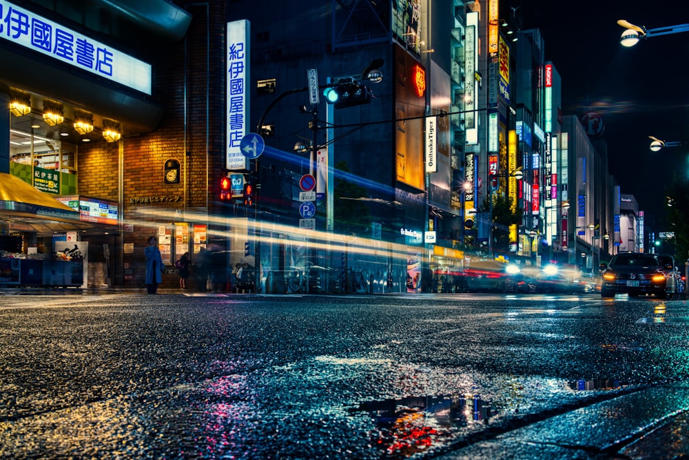 people walking on street during night time