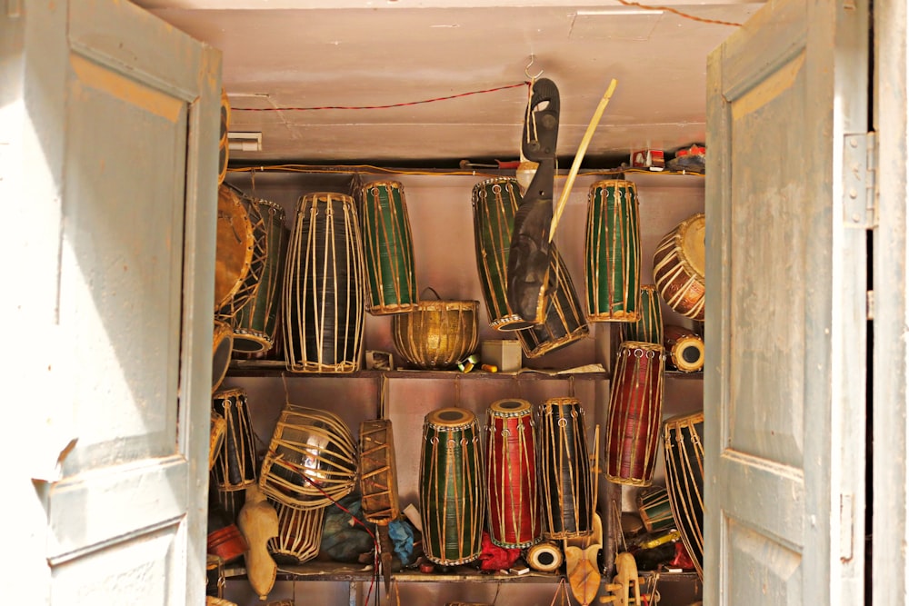 brown wooden hand tool in white wooden cabinet