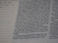 An image of a neatly handwritten research paper draft with annotations.