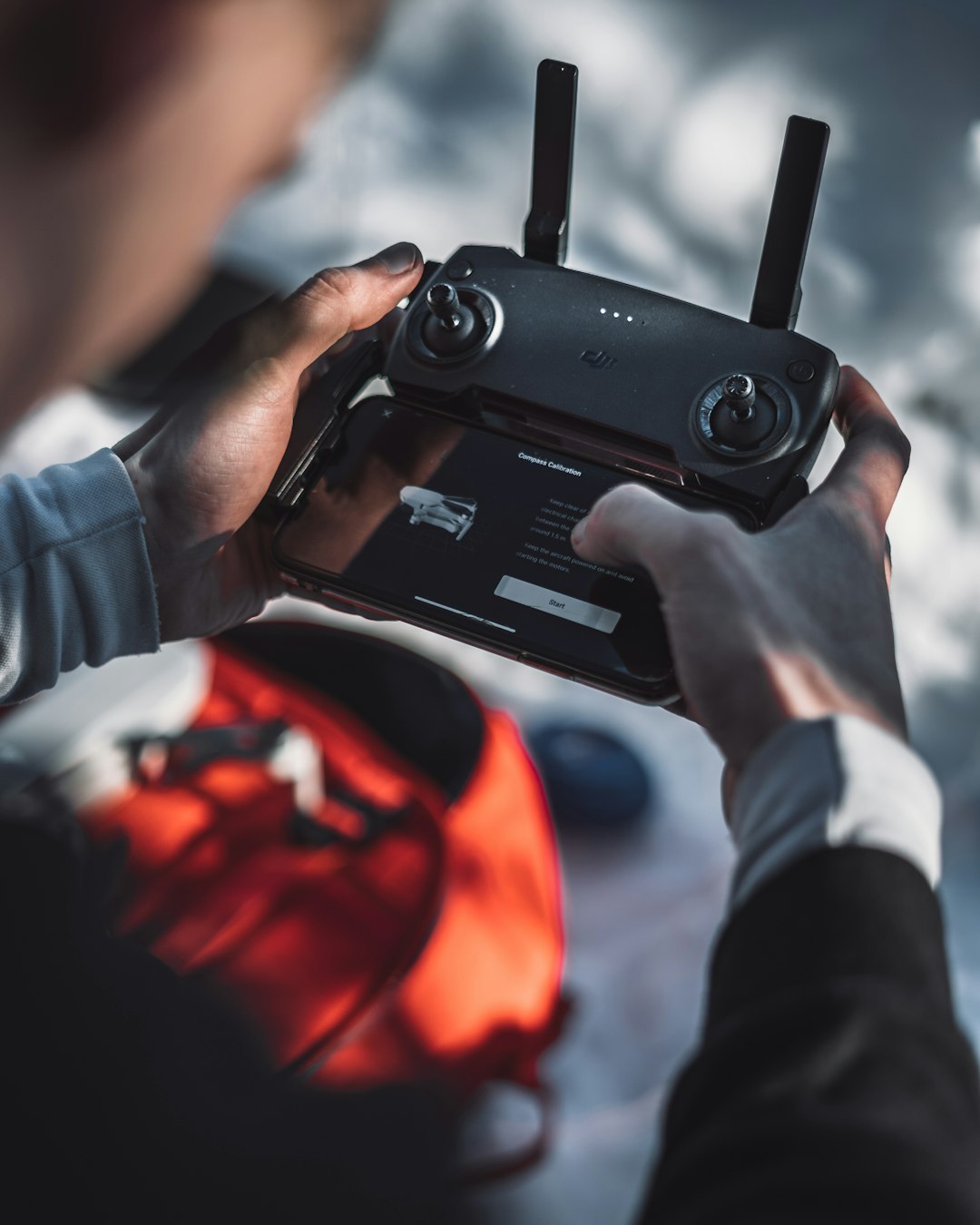 person holding black video camera