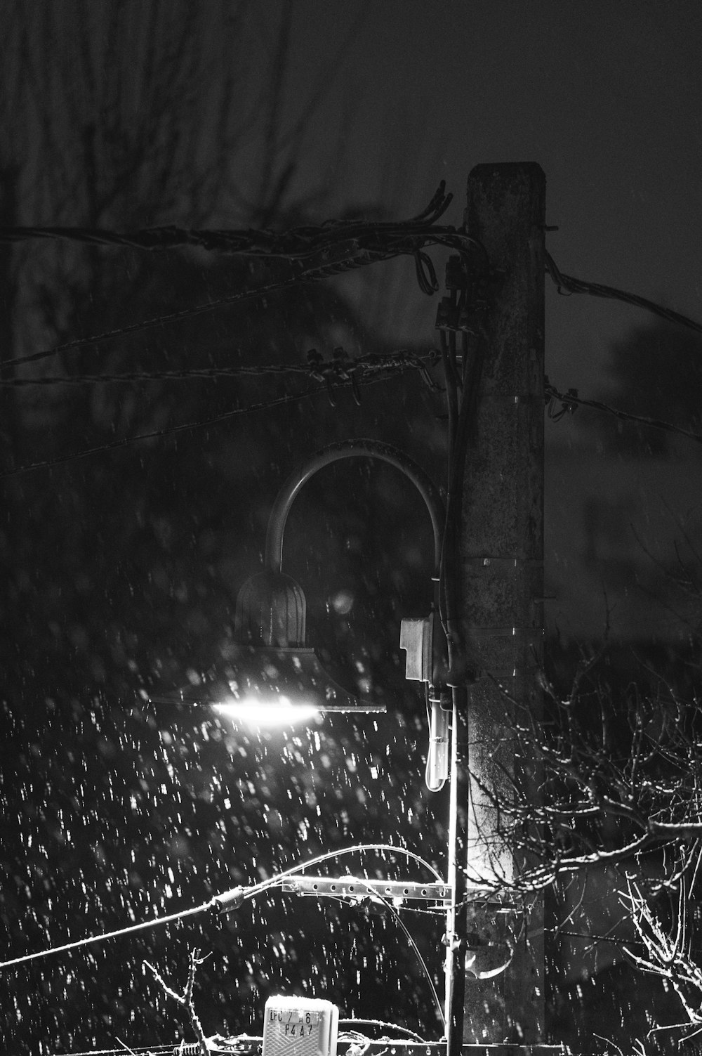 grayscale photo of string lights