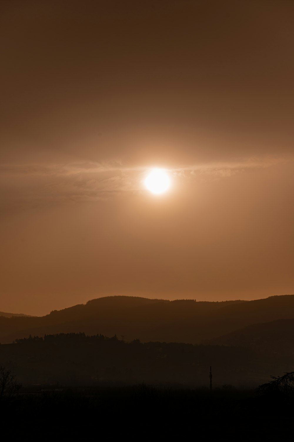 silhouette of mountain during sunset