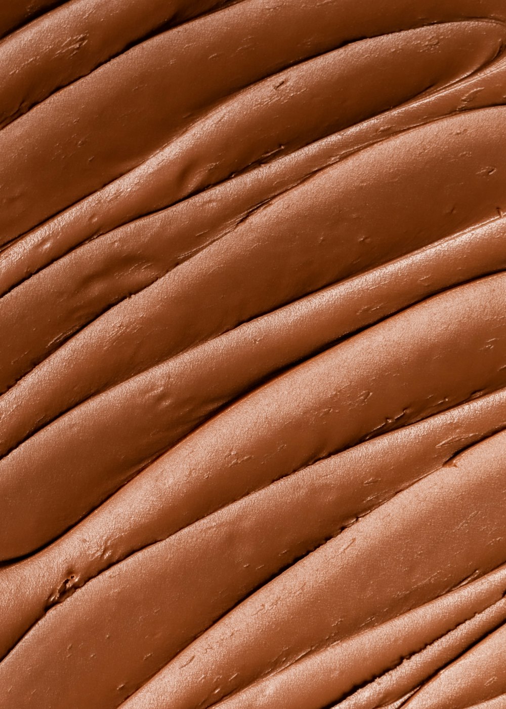 brown and white sand during daytime