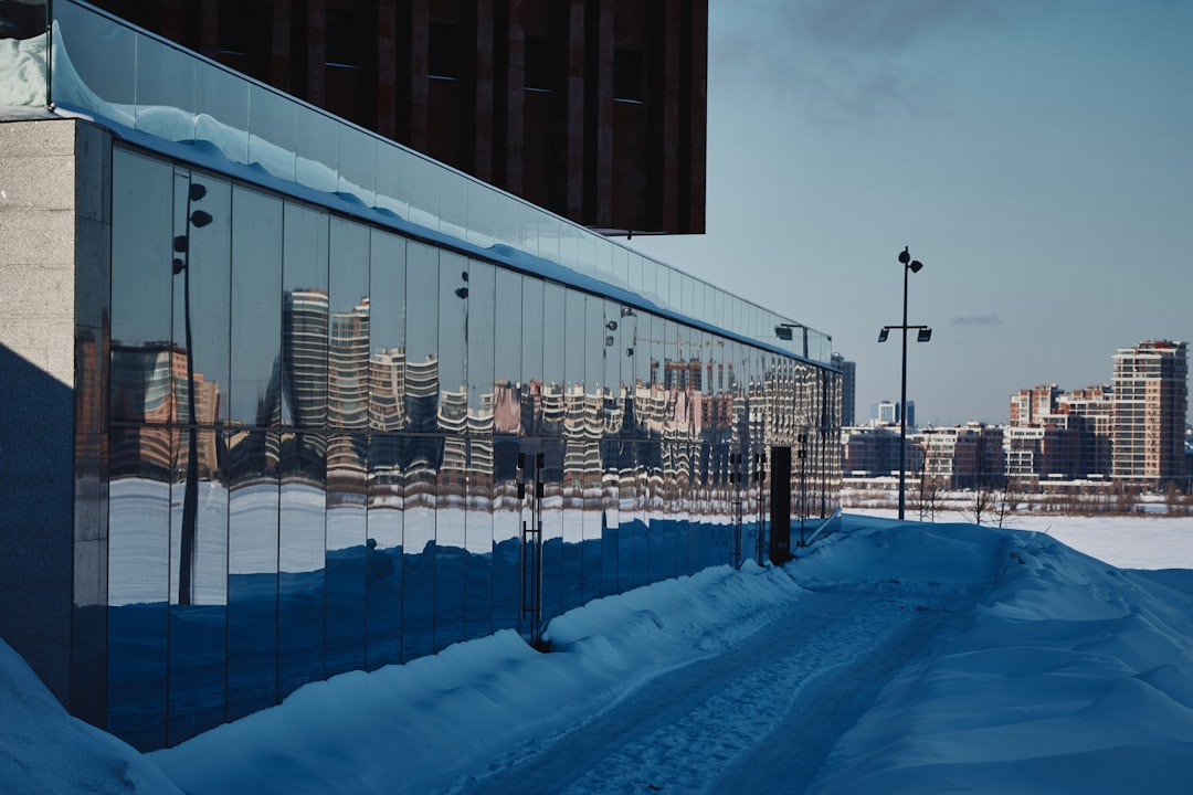 people walking on snow covered road during daytime