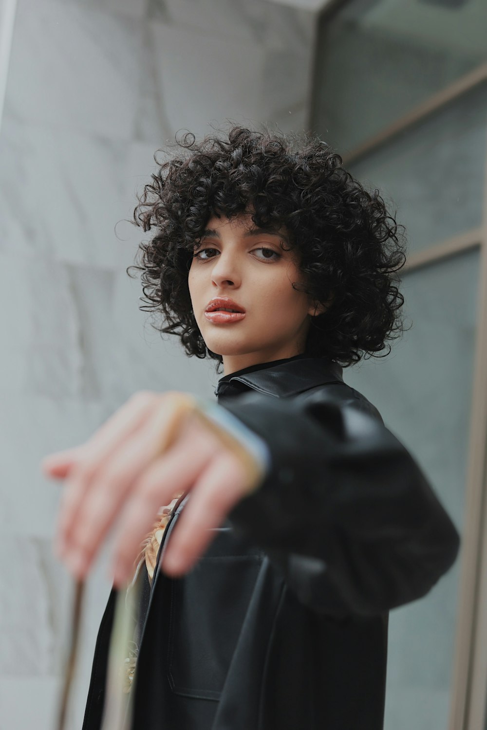 woman in black leather jacket