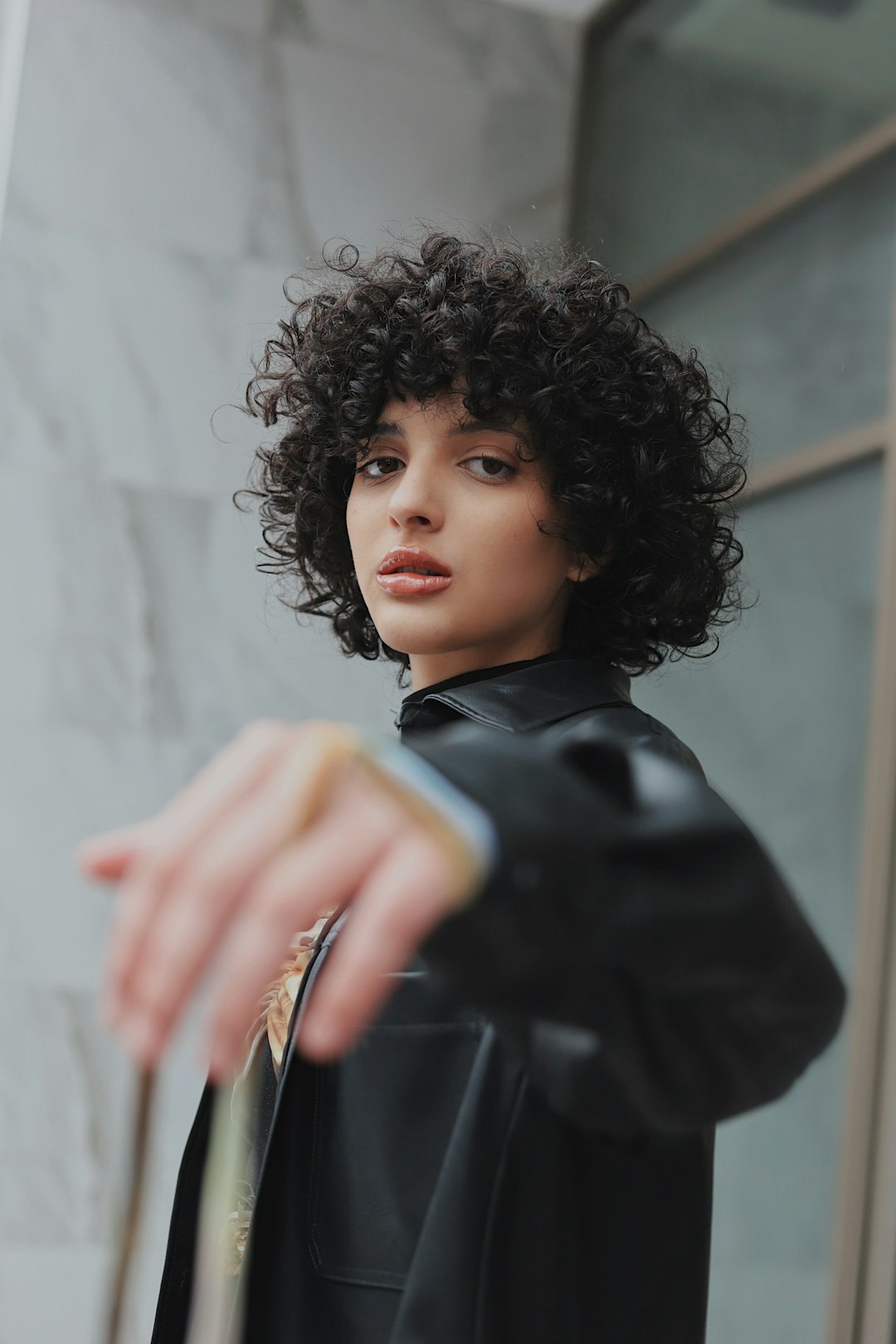 woman in black leather jacket