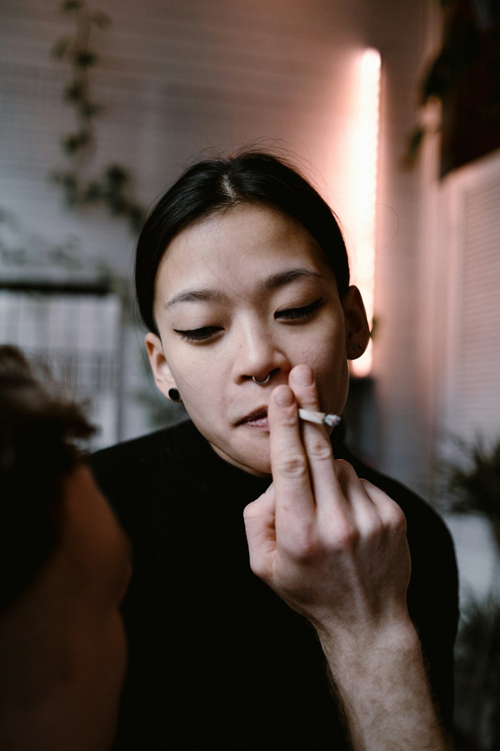 woman in black shirt with silver ring