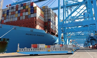 blue and white cargo ship