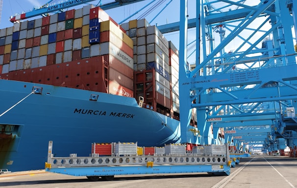 blue and white cargo ship