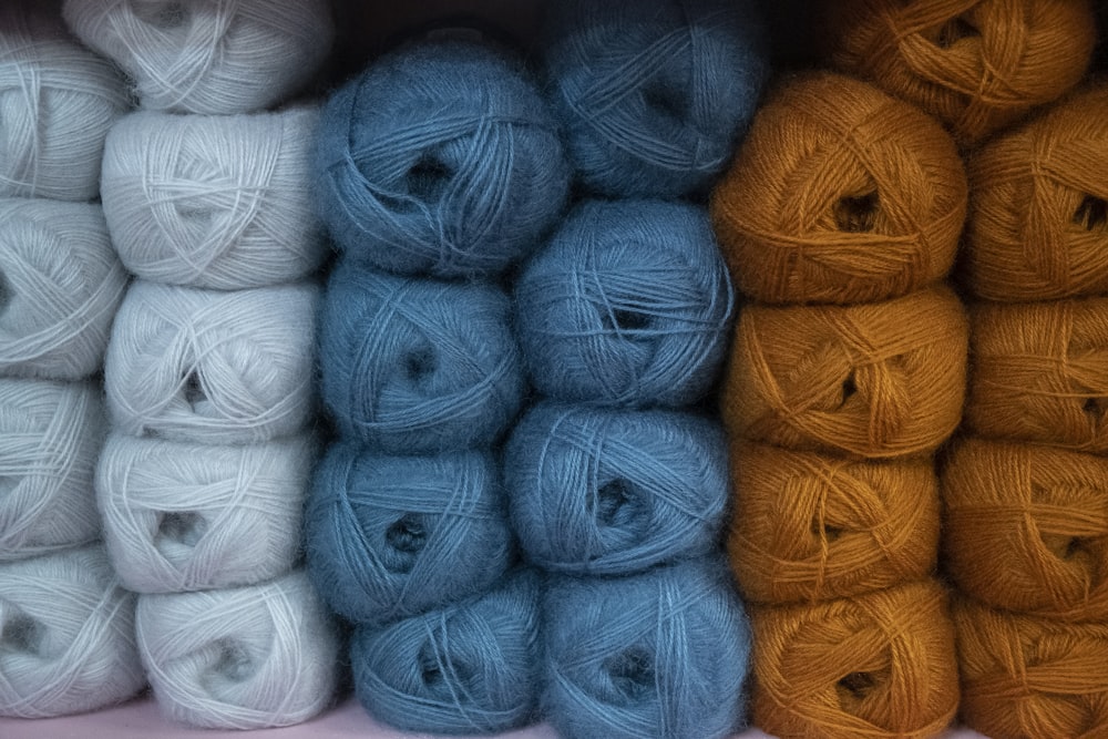 blue and orange yarn roll