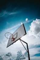 basketball hoop under blue sky during daytime