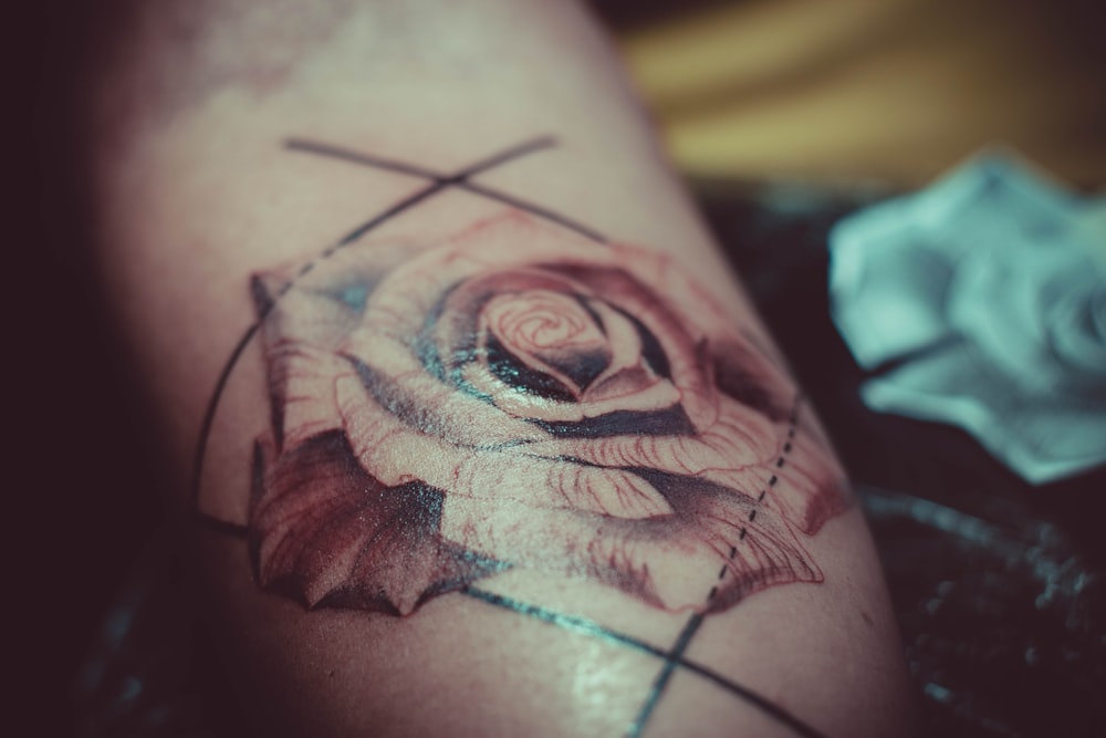 red and black rose tattoo