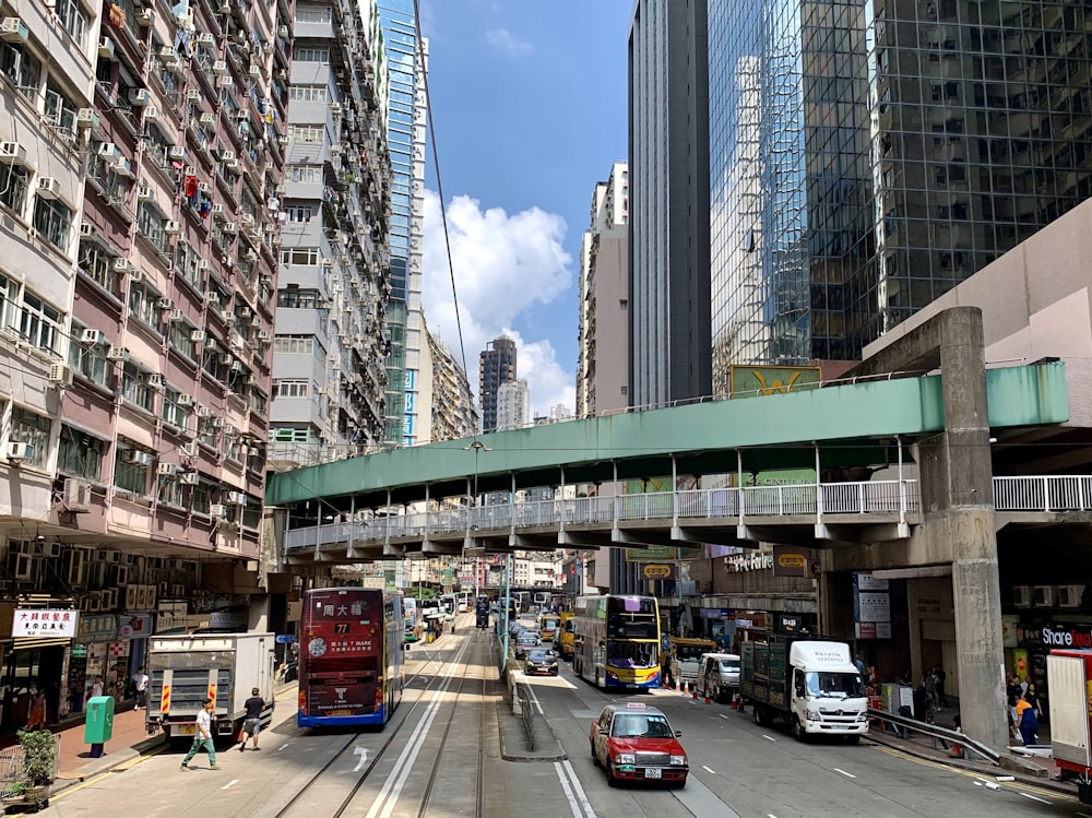 cars on road near buildings during daytime