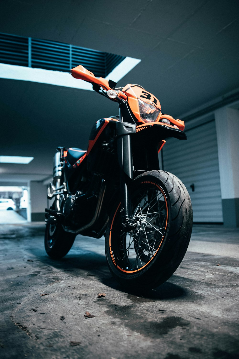 black and orange sports bike