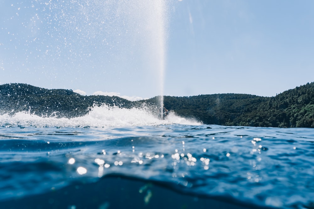 water splash on blue water