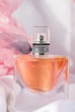 pink and silver perfume bottle