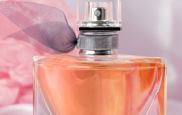 pink and silver perfume bottle