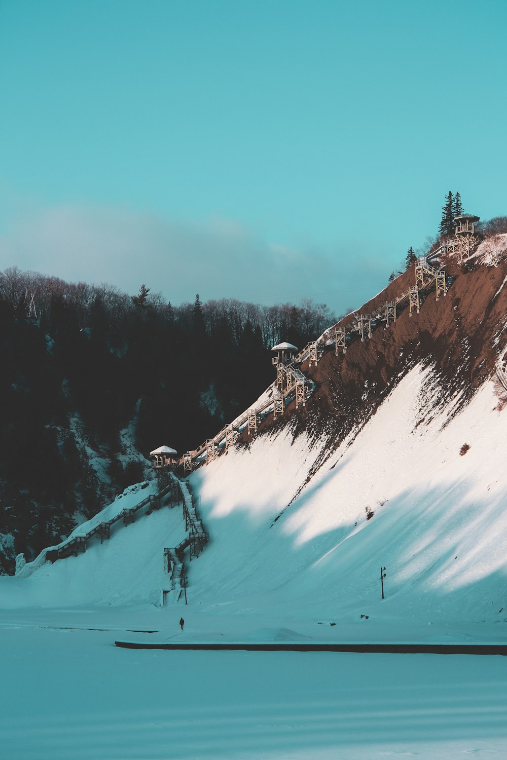 snow covered mountain during daytime