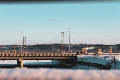 bridge over water during daytime granular google meet background