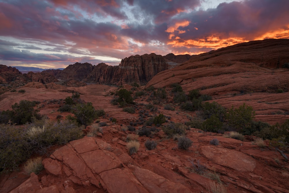 brown rocky mountain under cloudy sky during daytime