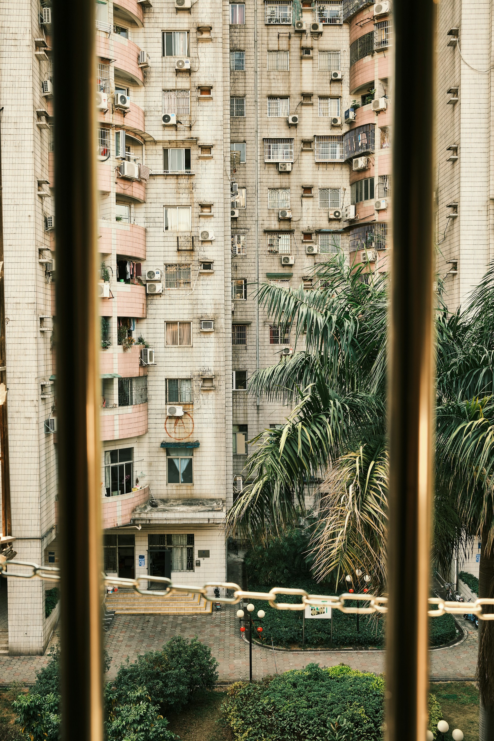 woman wearing yellow long-sleeved dress under white clouds and blue sky during daytime
