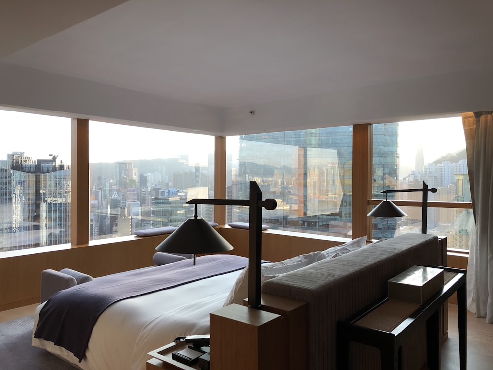 white bed near brown wooden table