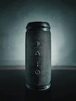 High-tech Bluetooth speaker with smooth curves and glowing LED lights
