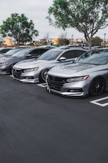 black mercedes benz coupe on parking lot during daytime