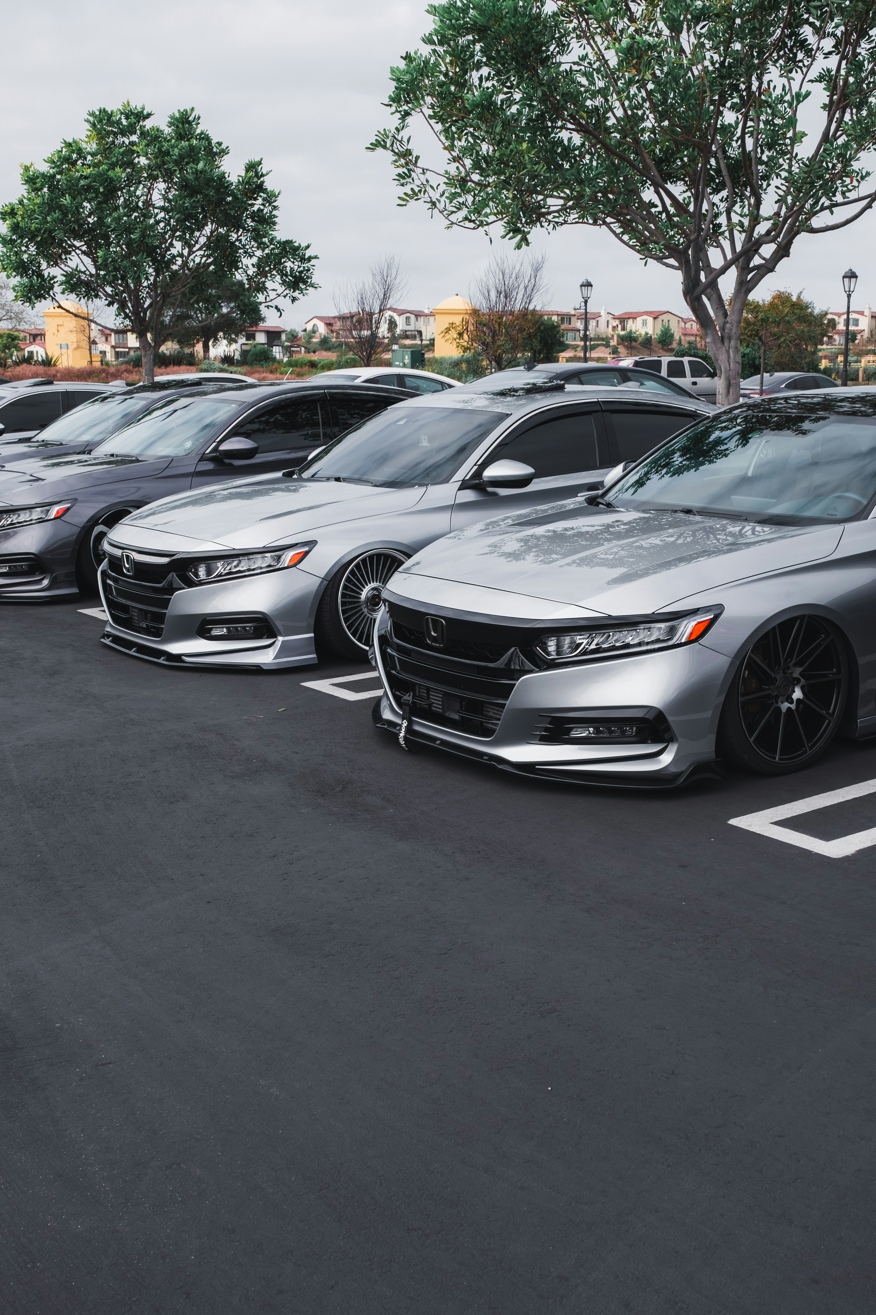 black mercedes benz coupe on parking lot during daytime