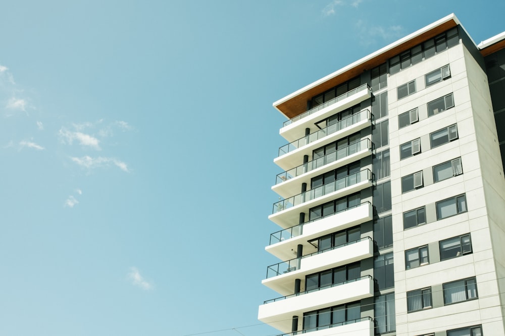 white concrete building under blue sky during daytime