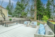 Image illustrating the transformation of outdoor living spaces with composite decking in modern hous