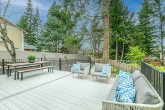 white wooden bench on wooden deck