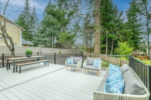 white wooden bench on wooden deck