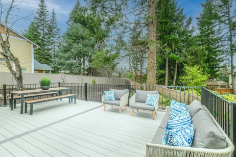 white wooden bench on wooden deck