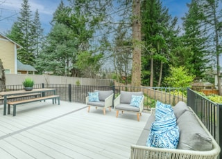 white wooden bench on wooden deck