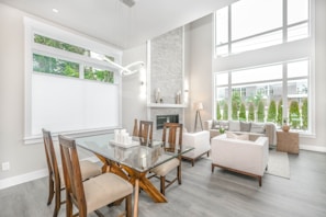 Spacious living area with comfortable seating and bright decor.