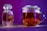 A glass jar containing saffron sits next to a transparent teapot filled with saffron tea. The vibrant orange hues of the saffron contrast with the bright purple background, creating a visually striking composition.