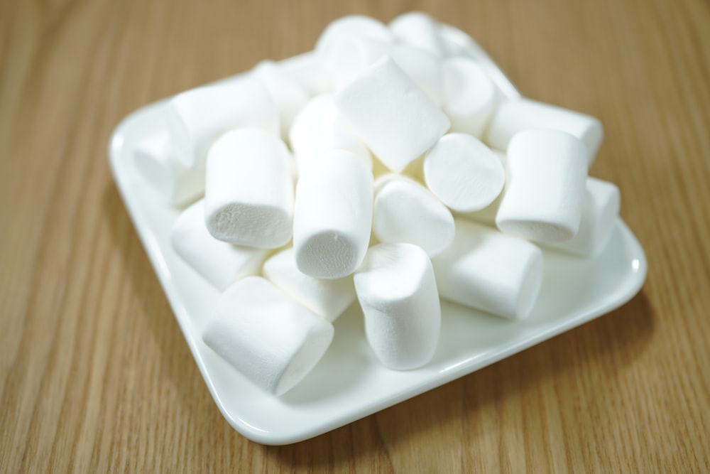 white sugar cubes on white rectangular tray