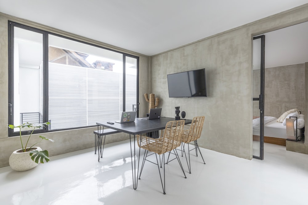 black flat screen tv on brown wooden table