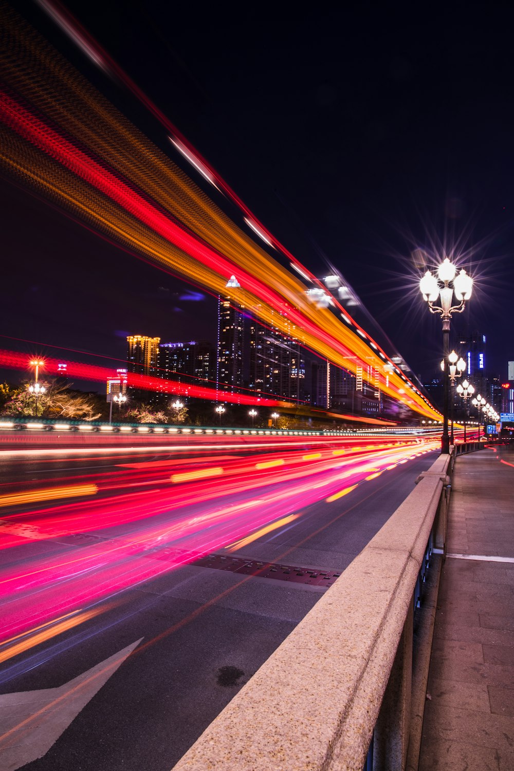 time lapse photography of cars on road during night time