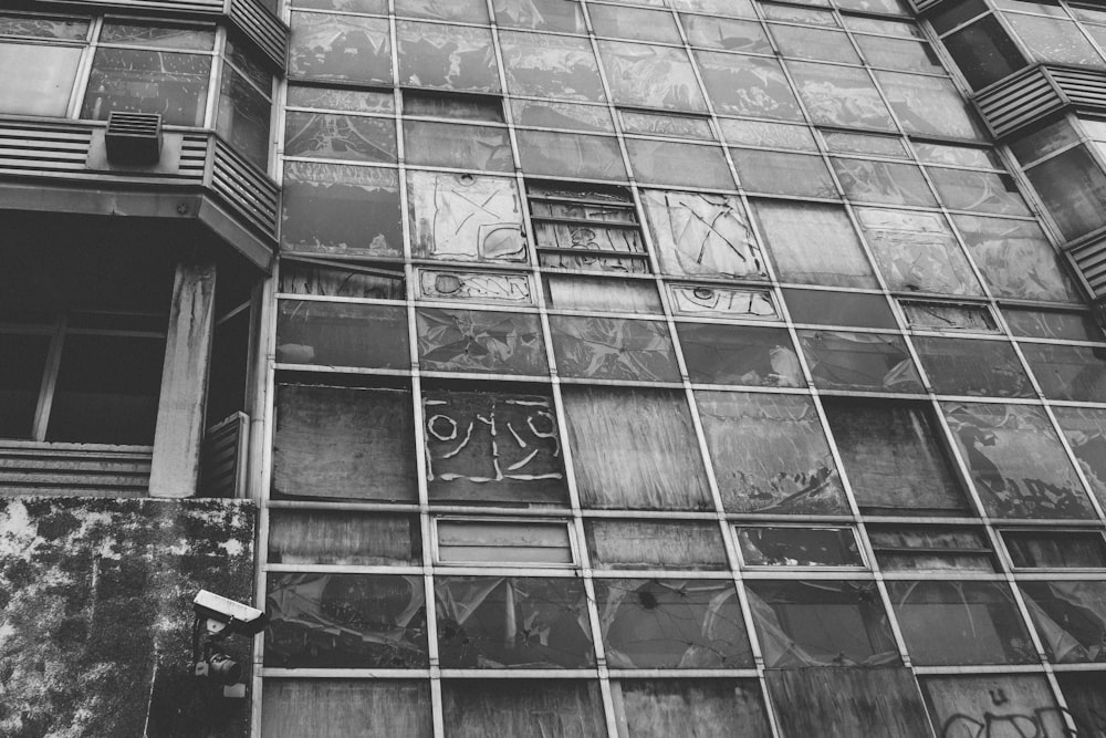 grayscale photo of glass window